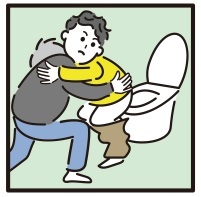 トイレの介助をしている画像